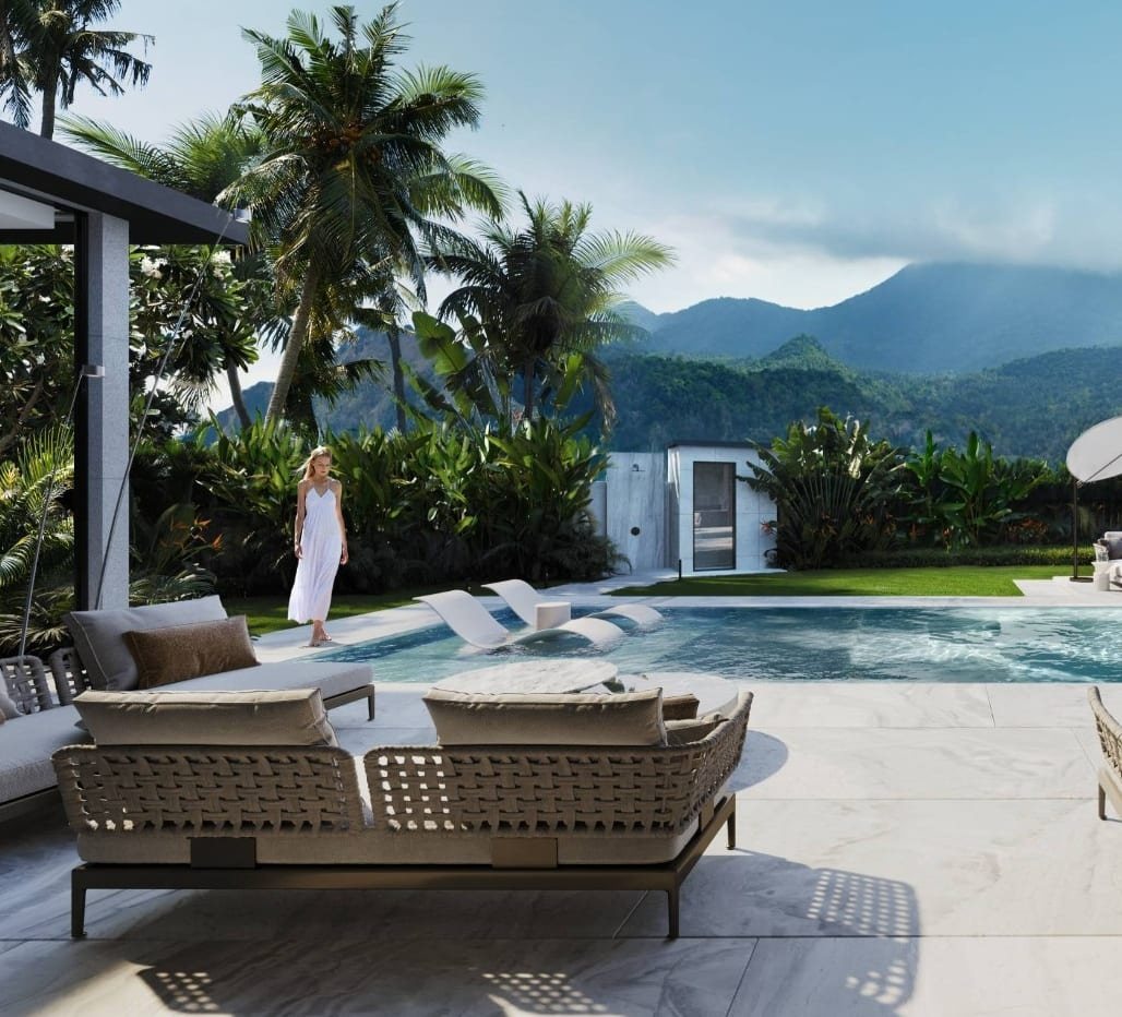 Pool terrace of a Sunti Villas villa with mountain views
